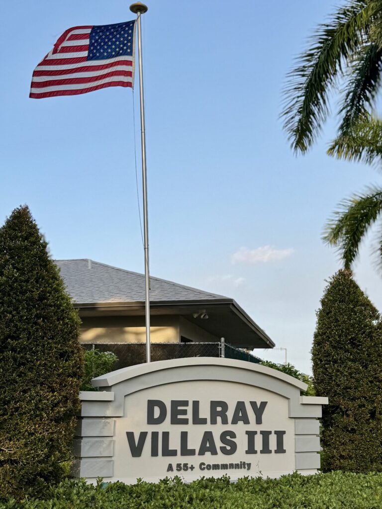 Delray Villas 3 - Entrance Sign and American Flag - Web Optimized